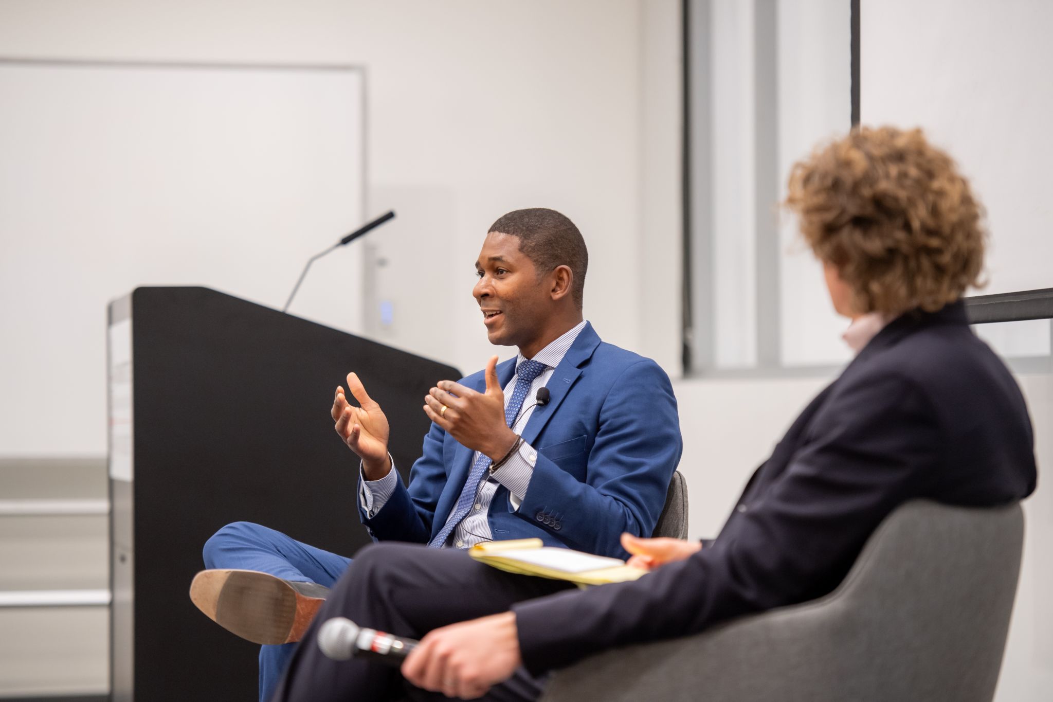 C. Kirabo Jackson in conversation at a public talk